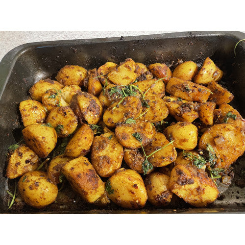 Tray of roasted bombay potatoes